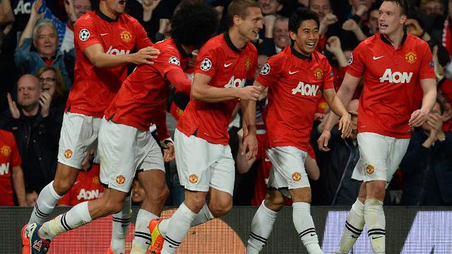 Selebrasi gol Nemanja Vidic (ANDREW YATES / AFP)