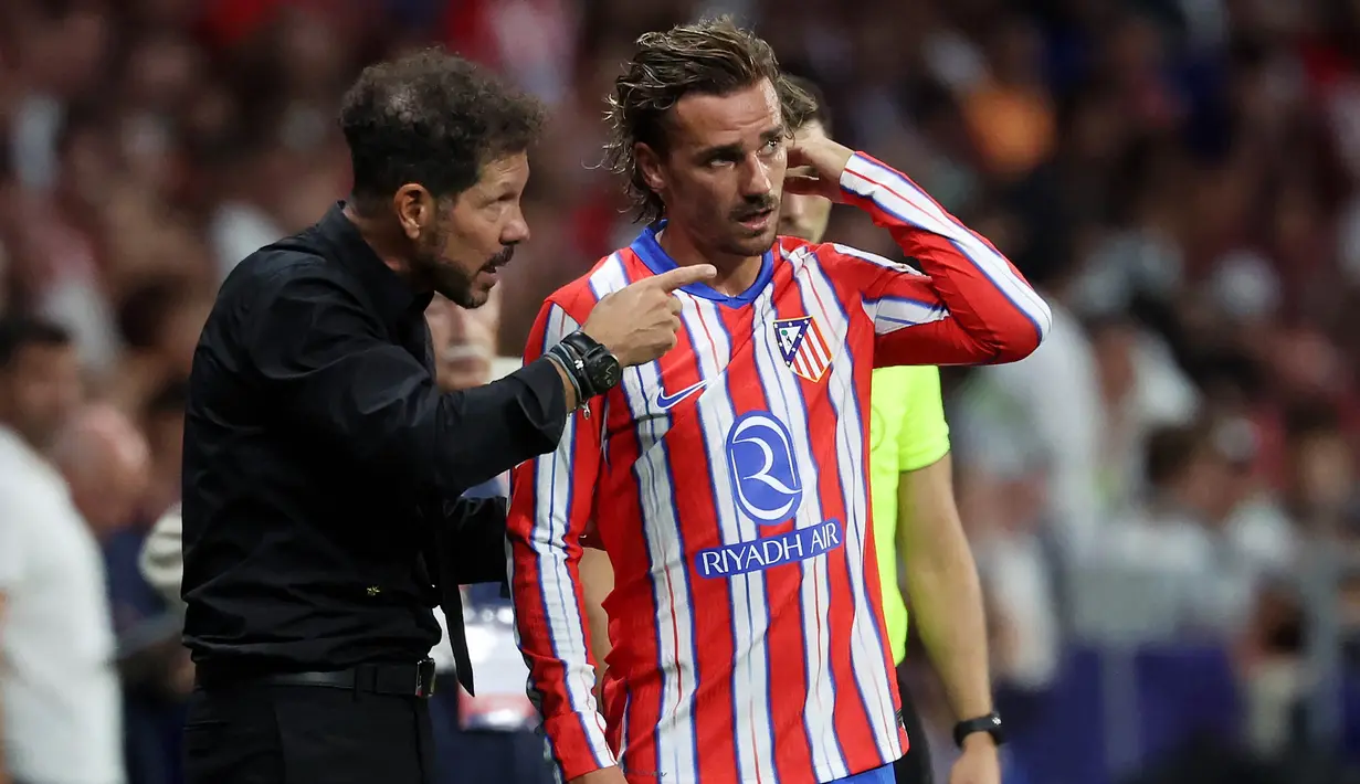 Gol pembuka kemenangan Atletico Madrid dicetak Antoine Griezmann di menit ke-39. (Pierre-Philippe MARCOU/AFP)