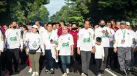 Ketua DPR RI Puan Maharani mengikuti acara jalan sehat Porseni Nahdlatul Ulama (NU) bersama Presiden Joko Widodo di Solo, Jawa Tengah. (dokumentasi tim Ketua DPR Puan Maharani)