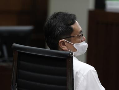 Terdakwa kasus dugaan korupsi di PT ASABRI Benny Tjokrosaputro menjalani sidang dengan agenda pembacaan putusan di Pengadilan Tindak Pidana Korupsi (Tipikor), Jakarta, Kamis (12/1/2023). Majelis hakim menyatakan terbukti bersalah kepada Benny Tjokrosaputro melakukan korupsi terkait pengelolaan keuangan dan dana investasi di PT Asabri tahun 2012-2019 yang merugikan keuangan negara hingga Rp22,7 triliun. (Liputan6.com/Johan Tallo)