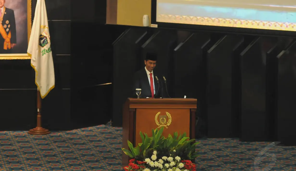 Gubernur yang juga Presiden terpilih Joko Widodo saat memeberikan sambutan di acara pelantikan Pimpinan DPRD DKI periode 2014-2019, (26/9/14). (Liputan6.com/Herman Zakharia)