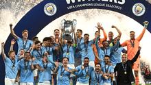Selebrasi juara para pemain Manchester City usai mengalahkan Inter Milan 1-0 pada final Liga Champions 2022/2023, Minggu (11/6/2023) dini hari WIB. (AFP/Paul Elis)