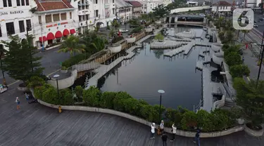 Suasana kawasan Kali Besar kawasan Kota Tua Jakarta, Selasa (21/4/2020). Seiring pelaksanaan WFH dan PSBB di DKI Jakarta, kawasan wisata terbuka yang biasanya ramai dikunjungi kini terlihat lengang. (Liputan6.com/Helmi Fithriansyah)