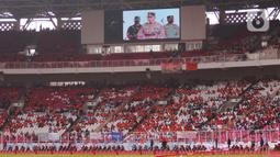 Layar memperlihatkan Kapolri Jenderal Pol Listyo Sigit Prabowo saat menyapa para buruh dalam  perayaan puncak Hari Buruh Indonesia bertajuk May Day Fiesta di Stadion Utama Gelora Bung Karno (GBK) Senayan, Jakarta, Sabtu (14/5/2022). Pada kesempatan itu, Kapolri juga mengucapkan selamat ulang tahun bagi seluruh buruh di Tanah Air, bertepatan dengan Hari Buruh Internasional pada 1 Mei 2022. (Liputan6.com/Angga Yuniar)