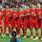 Para pemain starting XI Timnas Indonesia U-23 berbaris menyanyikan lagu kebangsaan Indonesia Raya sebelum dimulainya laga perebutan tempat ketiga Piala Asia U-23 2024 menghadapi Irak U-23 di Abdullah bin Khalifa Stadium, Doha, Qatar, Kamis (2/5/2024). (AFP/Karim Jaafar)