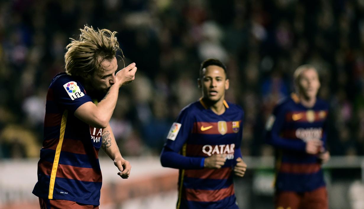 Ekspresi pemain Barcelona, Ivan Rakitic, setelah mencetak gol ke gawang Rayo Vallecano pada laga La Liga Spanyol di Estadio del Rayo Vallecano, Madrid, Jumat (4/3/2016) dini hari WIB. (AFP/Pierre-Philippe Marcou)