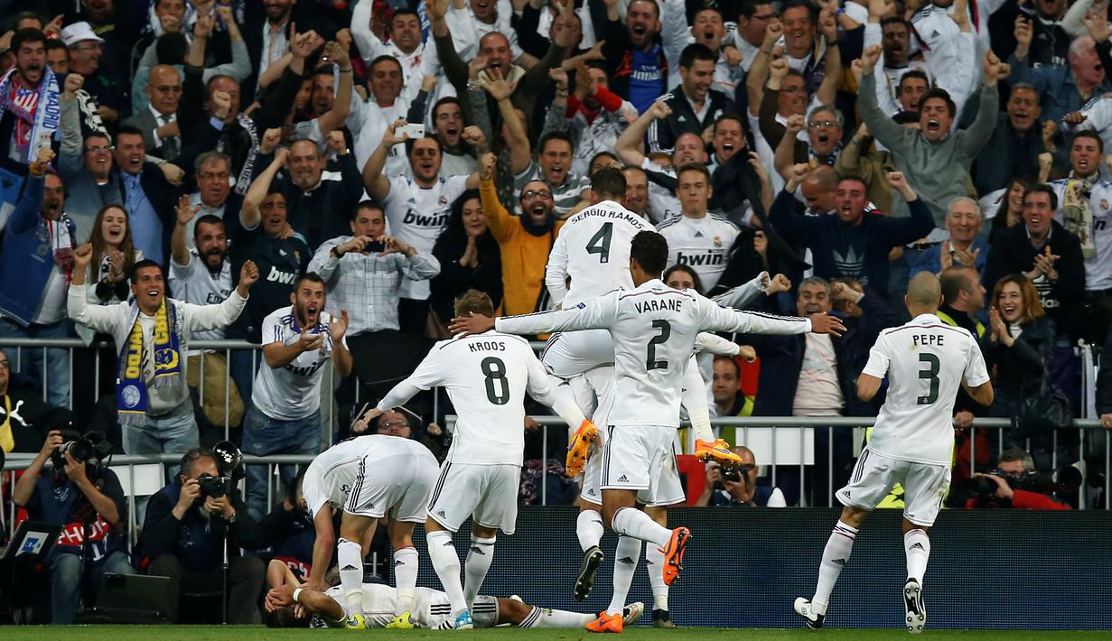 Berkat kemenangan ini, Real Madrid berhak melenggang ke semifinal Liga Champions dengan keunggulan agregat 1-0. Di leg pertama, Madrid ditahan imbang 0-0 Atletico. (AP Photo/Andres Kudacki)