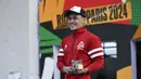 Ekspresi bahagia atlet panjat tebing Indonesia, Veddriq Leonardo setelah menjuarai ajang Kualifikasi Olimpiade 2024 panjat tebing nomor speed di Shanghai, China, Sabtu (18/05/2024) waktu setempat. (AFP/Wang Zhao)