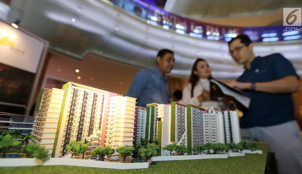 Sebuah maket plan yang mengusung konsep Transit Oriented Development digelar pada pameran properti LRT City Expo di Jakarta, Sabtu (21/7). Anak usaha dari PT Adhi Karya, Adhi Commuter Properti  menargetkan penjualan pemasaran Rp 19 miliar. (Liputan6.com)