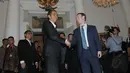 Berjas hitam dengan dasi abu-abu, Mark Zuckerberg disambut Jokowi di Balaikota, Jakarta, (13/10/14). (Liputan6.com/Herman Zakharia) 