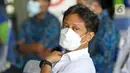Menteri Kesehatan Budi Gunadi Sadikin saat meresmikan Sentra Vaksinasi Indonesia Bangkit di RSUI, Depok, Jawa Barat, Kamis (25/3/2021). XL Axiata bekerja sama dengan RSUI yang didukung Kemenkes dan Pemkot Depok menggelar program Sentra Vaksinasi Indonesia Bangkit. (Liputan6.com/Herman Zakharia)