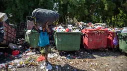 Permasalahan sampah plastik dan pengelolaannya masih menjadi tantangan besar di Indonesia. (JUNI KRISWANTO/AFP)