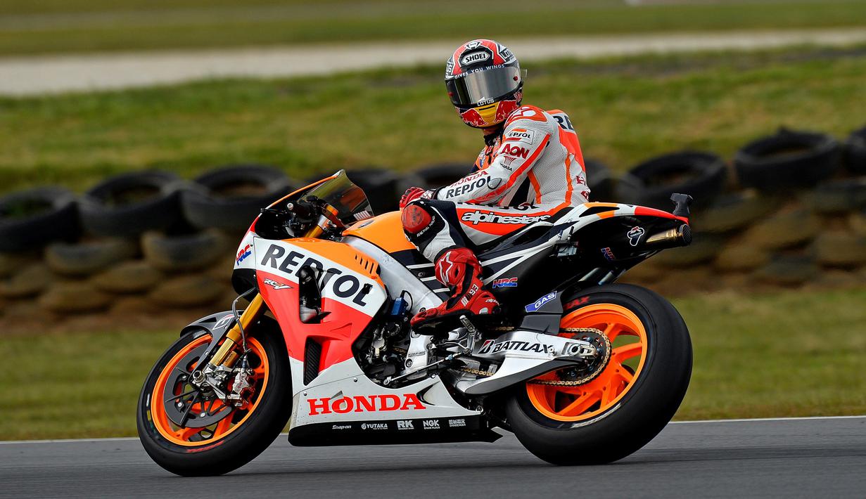 Raihan gelar juara dunia MotoGP 2013 membuat Marc Marquez menjadi juara dunia MotoGP termuda, memecahkan rekor Valentino Rossi. (AFP/Saeed Khan)