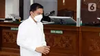 Terdakwa kasus obstruction of justice atau merintangi penyidikan pembunuhan berencana Brigadir Nofriansyah Yosua Hutabarat alias Brigadir J, Arif Rachman Arifin bersiap untuk mengikuti sidang lanjutan di Pengadilan Negeri Jakarta Selatan, Kamis (23/2/2023). Sidang tersebut beragenda pembacaan vonis oleh majelis hakim. (Liputan6.com/Herman Zakharia)