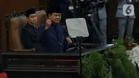 Presiden Republik Indonesia, Prabowo Subianto saat menyampaikan pidato pertamanya di depan sidang paripurna pelantikan Presiden dan Wakil Presiden terpilih periode 2024-2029 di Gedung Nusantara I Kompleks Parlemen, Jakarta, Minggu (20/10/2024). (Liputan6.com/Herman Zakharia)