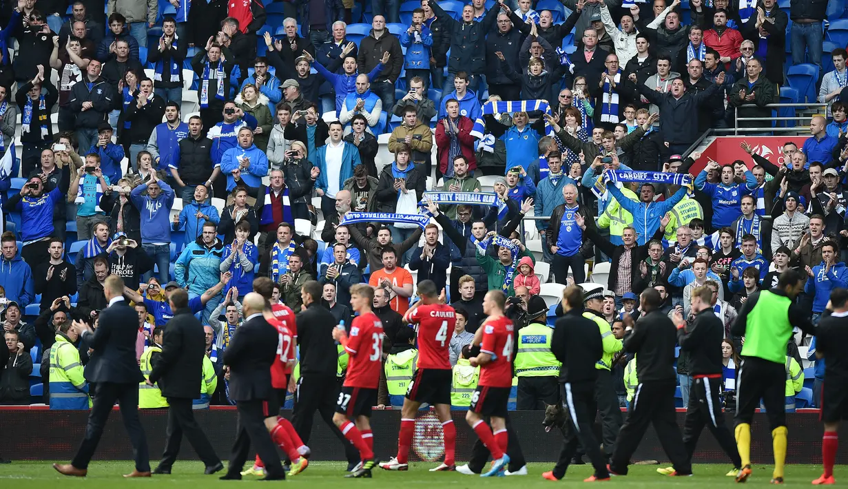 <p>Cardiff City. Pada musim 2012/2013 Cardiff City berhasil menjuarai Divisi Championship dan promosi ke Premier League 2013/2014 bersama dua klub lainnya, Hull City dan Crystal Palace. Di akhir musim 2013/2014 Cardiff City terdegradasi kembali ke Divisi Championship usai menempati posisi juru kunci klasemen dengan mengoleksi 30 poin, hasil dari 7 kali menang, 9 kali imbang dan 22 kali kalah. Dua klub promosi lainnya, Hull City dan Crystal Palace masing-masing menempati posisi ke-16 dan ke-11. (AFP/Ben Stansall)</p>