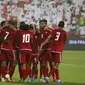 UAE's players celebrate after scoring a goal against Malaysia's team during their AFC qualifying football match for the 2018 FIFA World Cup / KARIM SAHIB / AFP