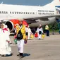 Jemaah haji Riau saat tiba di Bandara Sultan Syarif Kasim II Pekanbaru. (Liputan6.com/M Syukur)