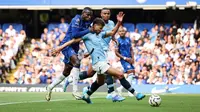 Manchester City meraih kemenangan 2-0 atas Chelsea pada laga pekan perdana Premier League musim ini di Stamford Bridge, Minggu (19/08/2024) malam WIB. Satu dari dua gol kemenangan City disarangkan Erling Haaland. (AFP/Adrian Dennis)