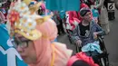 Sejumlah penyandang disabilitas mengikuti pawai budaya di kawasan MH Thamrin, Jakarta, Selasa (27/8/2019). Kegiatan bertema “Menuju Disabilitas Merdeka” tersebut menuntut pemerintah Indonesia untuk tidak melakukan diskriminasi terhadap mereka. (Liputan6.com/Faizal Fanani)