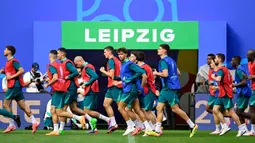 Ini merupakan latihan resmi timnas Portugal jelang laga melawan Republik Ceko pada pertandingan sepak bola Euro 2024 Grup F. (JOHN MACDOUGALL/AFP)