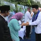 Pemkot Tangerang menggelar hajatan bagi 146 pasangan pengantin. Hajatan ini dilakukan setelah ratusan pengantin ini mengikuti isbat nikah atau nikah massal di Kanwil Kemenag Kota Tangerang. (Liputan6.com/Pramita Tristiawati)