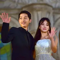 Kegiatan pasangan yang biasa disebut sebagai Song Song Couple ini pun kerap menjadi sorotan para awak media. (JUNG YEON-JE/AFP)
