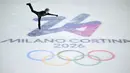Media olahraga menyoroti bagaimana Malinin telah mengubah standar figure skating modern dengan kombinasi loncatan teknisnya. (AFP/Julien De Rosa)