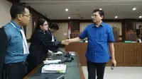 Advokat Lucas usai sidang di Pengadilan Tipikor Jakarta. (Merdeka.com/Yunita Amalia)