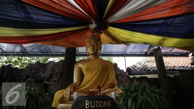 ilustrasi patung Buddha