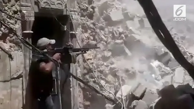 Baku Tembak di Reruntuhan Masjid Al Nuri Mosul