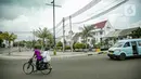 Warga bersepeda di kawasan rendah emisi Kota Tua, Jakarta, Rabu (17/2/2021). Kualitas udara di kawasan Kota Tua Jakarta membaik setelah kebijakan Low Emission Zone (LEZ) atau Zona Emisi Rendah diberlakukan sejak 8 Februari 2021. (Liputan6.com/Faizal Fanani)