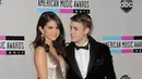 Meskipun Selena Gomez dan Justin Bieber sudah putus, keduanya masih memiliki koneksi hubungan cinta yang begitu kuat. (AFP/JASON MERRITT / GETTY IMAGES NORTH AMERICA)
