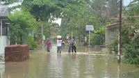 Banjir yang merendam belasan desa di Cilacap terjadi karena limpahan air dari pegunungan. (Liputan6.com/Muhamad Ridlo)
