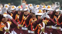 Polisi Cilik melakukan aksi baris-berbaris  saat CFD di kawasan Budaran HI, Jakarta, Minggu (3/7/2022). Aksi ini dalam rangka memeriahkan HUT ke-76 Bhayangkara. (Liputan6.com/Angga Yuniar)