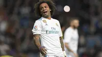 Sebagai bek, pemain asal Brasil, Marcelo terbilang produktif dengan membatu serangan dan mencetak satu gol untuk Real Madrid hingga pekan ke-11 La Liga Santander 2017-2018. (AFP/Gabriel Bouys)