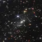 Foto perdana dari Teleskop Ruang Angkasa James Webb milik NASA menampilkan gugusan galaksi dengan gambar paling jelas dalam sejarah. (Dok.&nbsp;NASA, ESA, CSA, and STScI)
&nbsp;