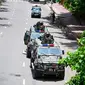 Personel militer terlihat berpatroli di ibukota dan daerah-daerah lain. (Munir UZ ZAMAN/AFP)