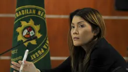 Presiden Direktur PT Parna Raya Industri, Artha Meris Simbolon, saat menjalani sidang lanjutan di Pengadilan Tipikor, Jakarta, (12/10/14). (Liputan6.com/Miftahul Hayat) 