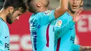 Pemain Barcelona, Paco Alcacer merayakan gol ke gawang Real Murcia pada leg pertama 32 besar Piala Raja di stadion Nuevo Condomina, Rabu (25/10). Tanpa Lionel Messi dan Luis Suarez, Barcelona menggasak tuan rumah, 3-0. (AP/Ferran Viros)