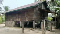 Rumah terduga teroris di Desa Kuapan, Kabupaten Kampar, yang ditangkap Densus 88 Anti Teror pada akhir pekan lalu. (Liputan6.com/M Syukur)