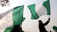 Bendera Nigeria (AFP Photo / Sodiq Adelakuin)