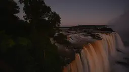 Iguazu Falls memang menjadi obyek wisata yang digemari oleh banyak wisatawan. (Mariana SUAREZ / AFP)