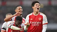 Di balik kehebatan Arsenal asuhan Mikel Arteta dalam beberapa musim terakhir di Liga Inggris, terdapat sosok pesepak bola asal Jepang, Takehiro Tomiyasu yang manjadi andalan di lini belakang The Gunners. Jauh sebelum memutuskan hijrah ke Eropa, pesepak bola kelahiran Fukuoka 25 tahun lalu ini merupakan alumnus J.League bersama Avispa Fukuoka. (AFP/Glyn Kirk)