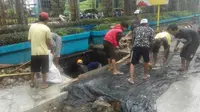 Salah satunya menghalau banjir dari daerah langganan banjir di Makassar. (Liputan6.com/Eka Hakim)