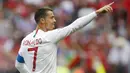 Striker Portugal, Cristiano Ronaldo, melakukan selebrasi usai mencetak gol ke gawang Maroko pada laga Piala Dunia di Stadion Luzhniki, Rabu (20/6/2018). Ronaldo menjadi pencetak gol internasional terbanyak di Eropa dengan 85 gol. (AP/Francisco Seco)