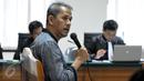 Mantan Dirjen Penyelenggaraan Haji dan Umrah Kemenag, Anggito Abimanyu memberi kesaksian di Pengadilan Tipikor, Jakarta, Senin (26/10/15).  Anggito menyatakan PPP merupakan partai yang paling banyak mendapat jatah kuota haji. (Liputan6.com/Helmi Afandi) 