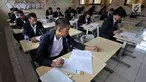 Suasana Ujian Sekolah Berbasis Komputer (USBK) Paket C di Gedung SDN 03 Sumur Batu, Kemayoran, Jakarta, Kamis (21/3). USBK Paket C di Kecamatan Kemayoran diikuti oleh 359 peserta. (merdeka.com/Iqbal Nugroho)