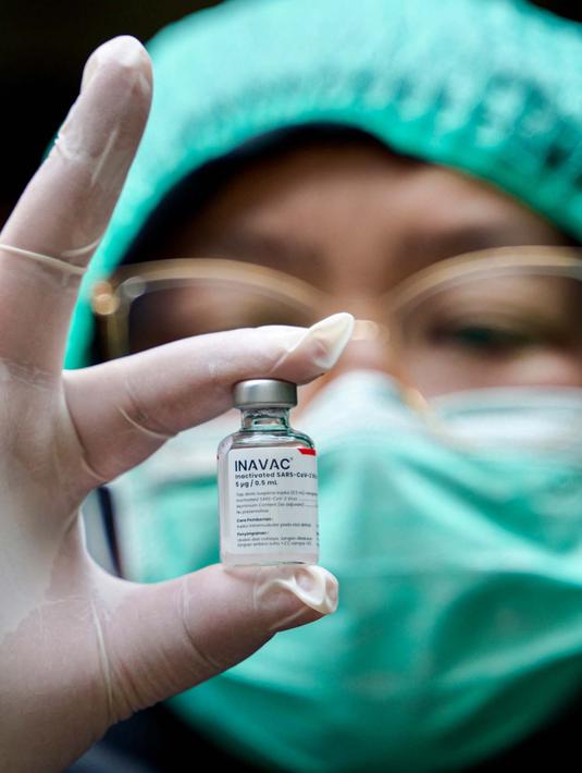 Pemerintah melalui Dirjen Pencegahan dan Pengendalian Penyakit kembali mengkampanyekan vaksinasi dan memberikan dosis vaksin pencegahan kelima. (BAY ISMOYO/AFP)