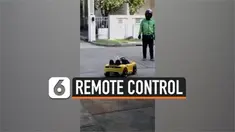 Seorang pria di Thailand tidak berani keluar rumah karena takut terpapar virus corona. Ia menggunakan mobil remote control untuk mengambil makanan yang dipesan lewat jasa antar.